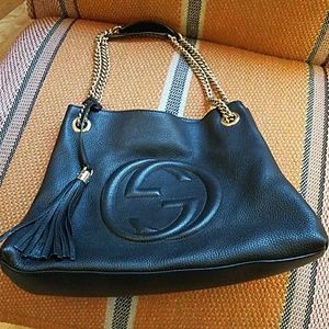 Black leather Gucci purse
